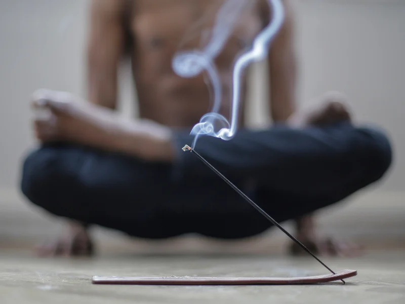 Image showing a peaceful meditator after finding the right agarwood incense.